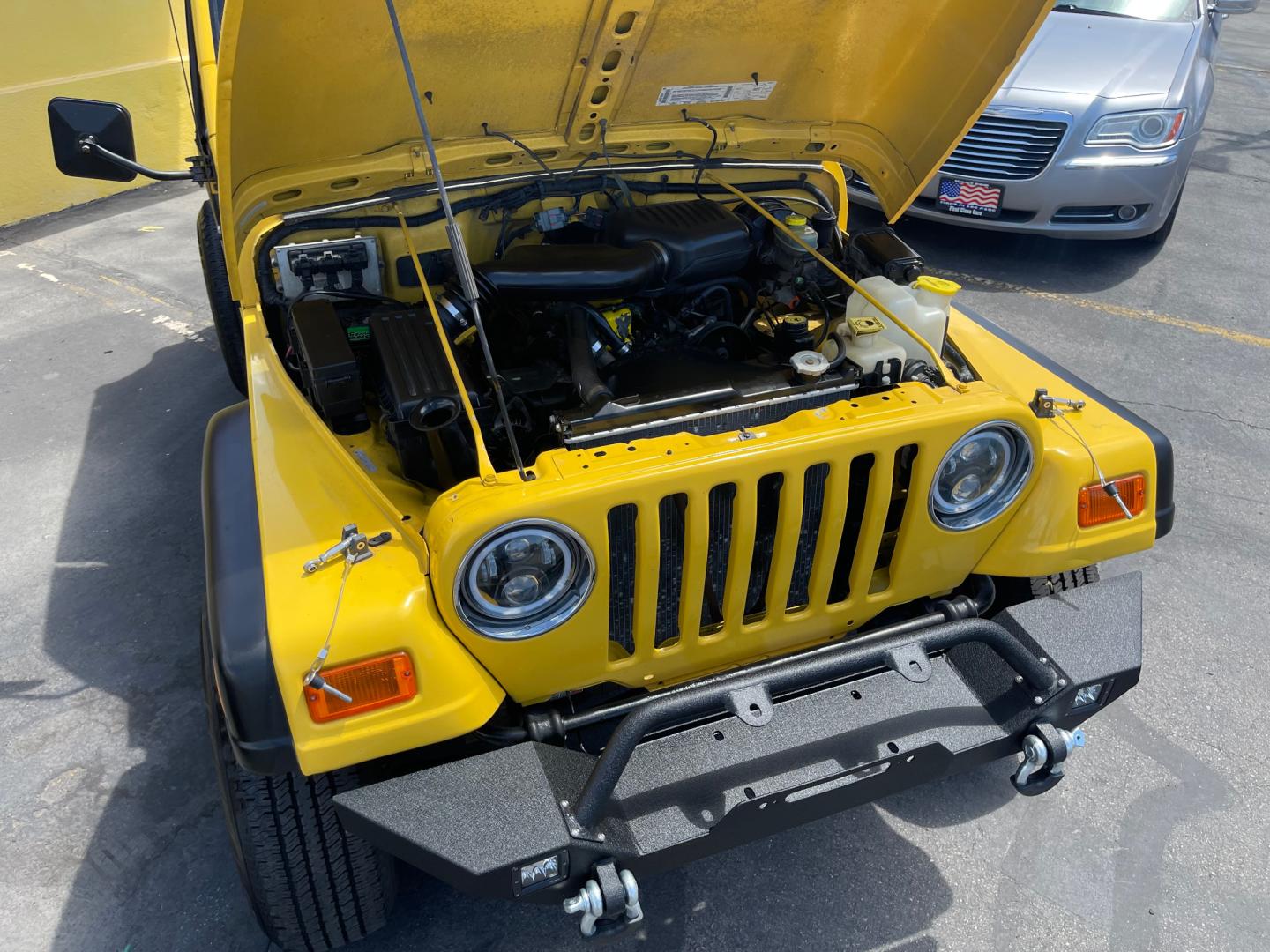 2000 Solar Yellow /Black Jeep Wrangler SE (1J4FA29P9YP) with an 2.5L 4 Cyl. engine, Manual transmission, located at 801 South State Street, Salt Lake City, UT, 84111, (801) 328-0098, 40.751953, -111.888206 - Wow extremely rare to find extra clean Jeep in immaculate condition 4x4! Low miles only 98,248 miles! Interior and exterior are both in excellent shape for the year. This is a clean title no reported accidents on the CarFax history report. It has passed emissions already and is ready to go. Featur - Photo#41